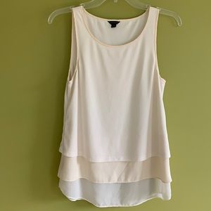 Ann Taylor cream shell with multi layers of chiffon.